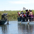 Crown Prince Haakon fishing with local fishermen in the Okavango delta (Photo: Ida Fjeldbraaten, The Royal Court)